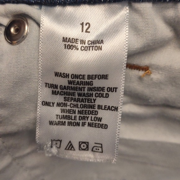 Mid Rise Distressed Front Roll Cuff Shorts 12 by Anvain - Picture 7 of 11